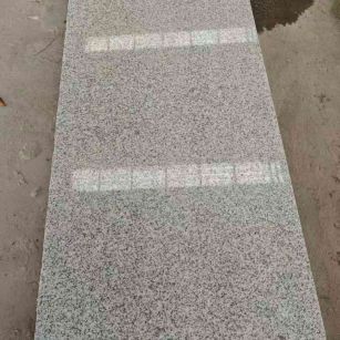 嘉兴芝麻白光面毛板